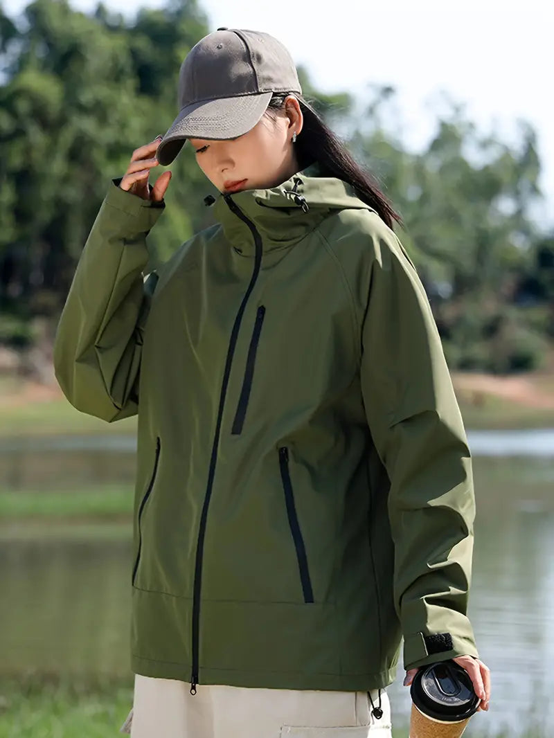 Jutte - Regenmantel mit Kapuze und Taschen für Damen - Wasser- und winddicht