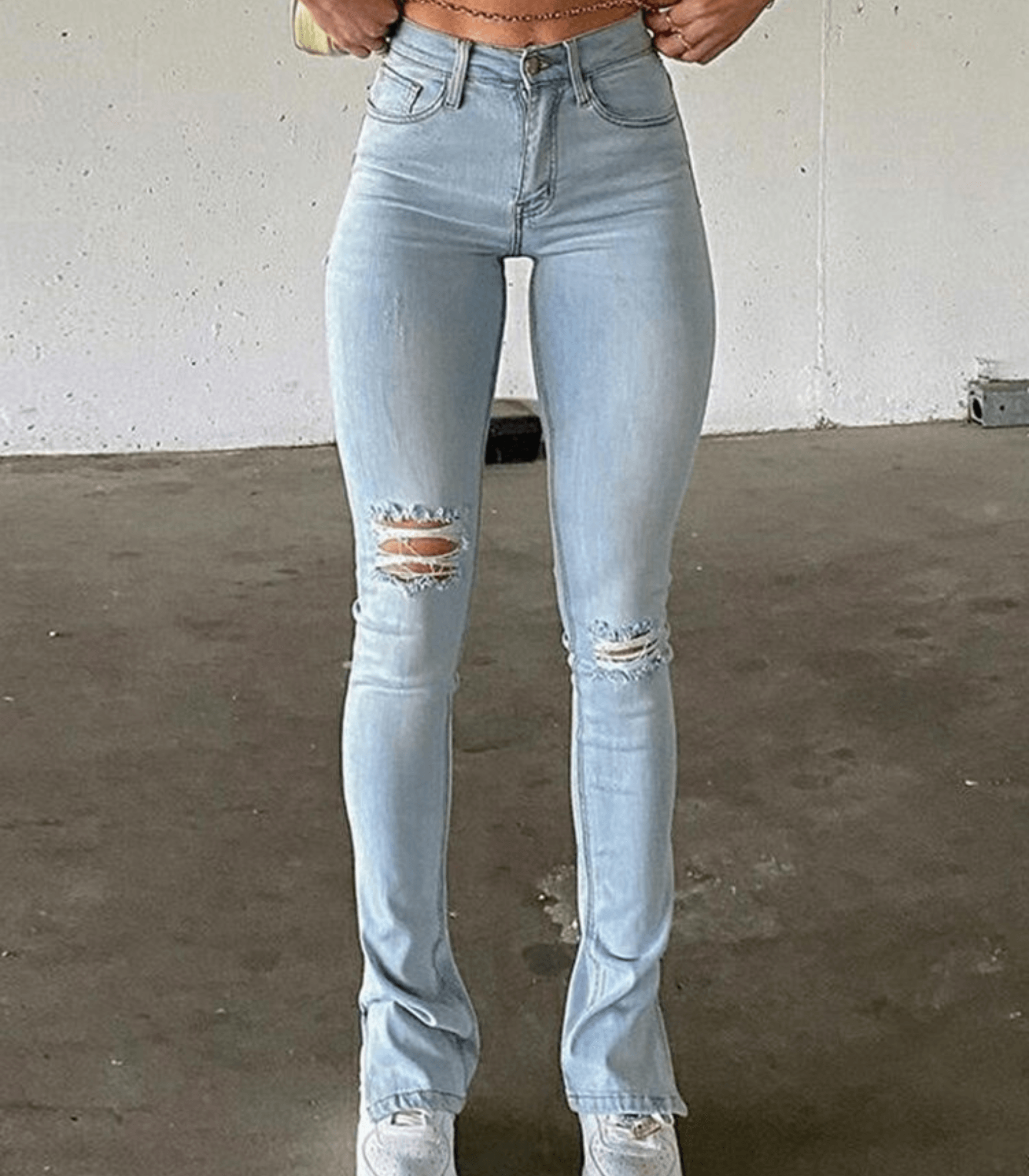 Zerrissene enge Jeggings mit hoher Taille